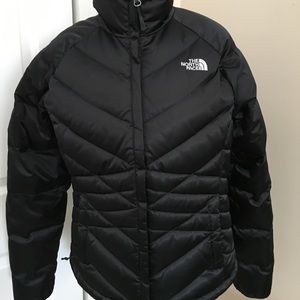 The north face black puffy jacket